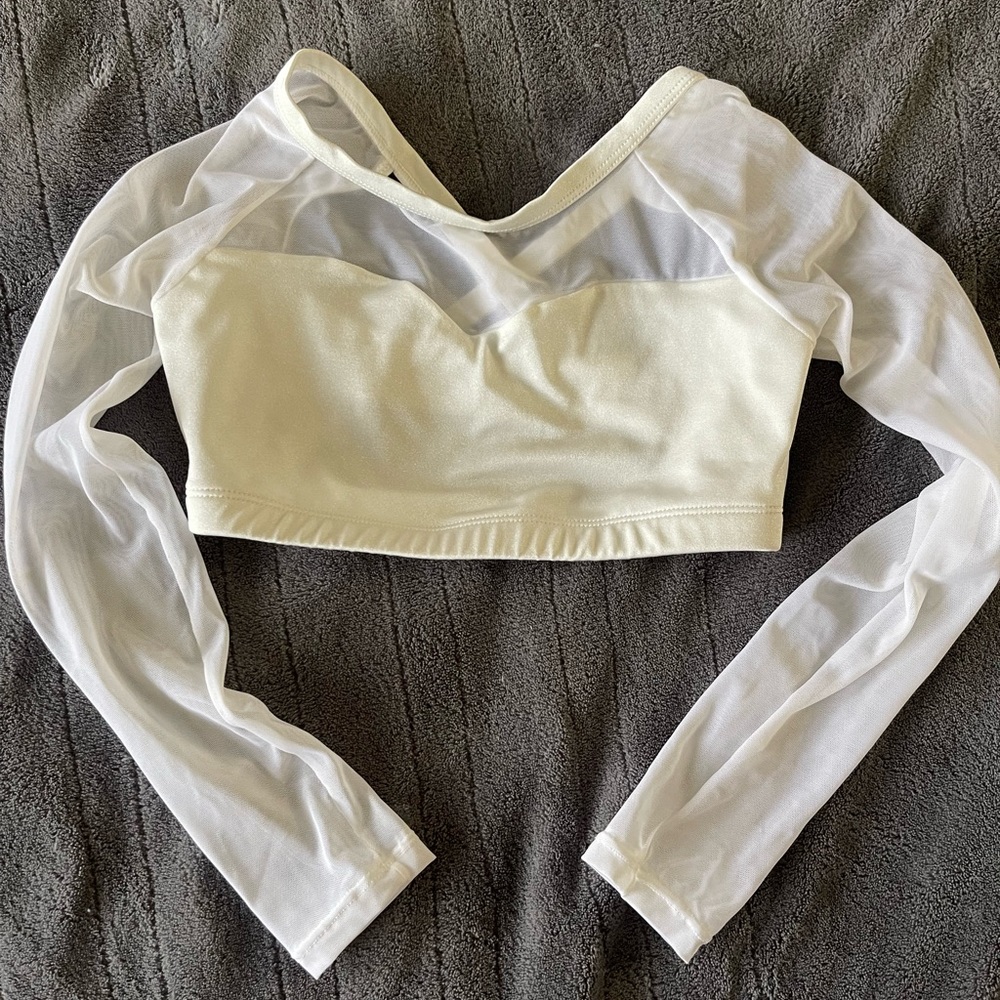 Body Wrappers
Cris cross back 
Worn twice 
Size 8-10;runs small like size 7-8